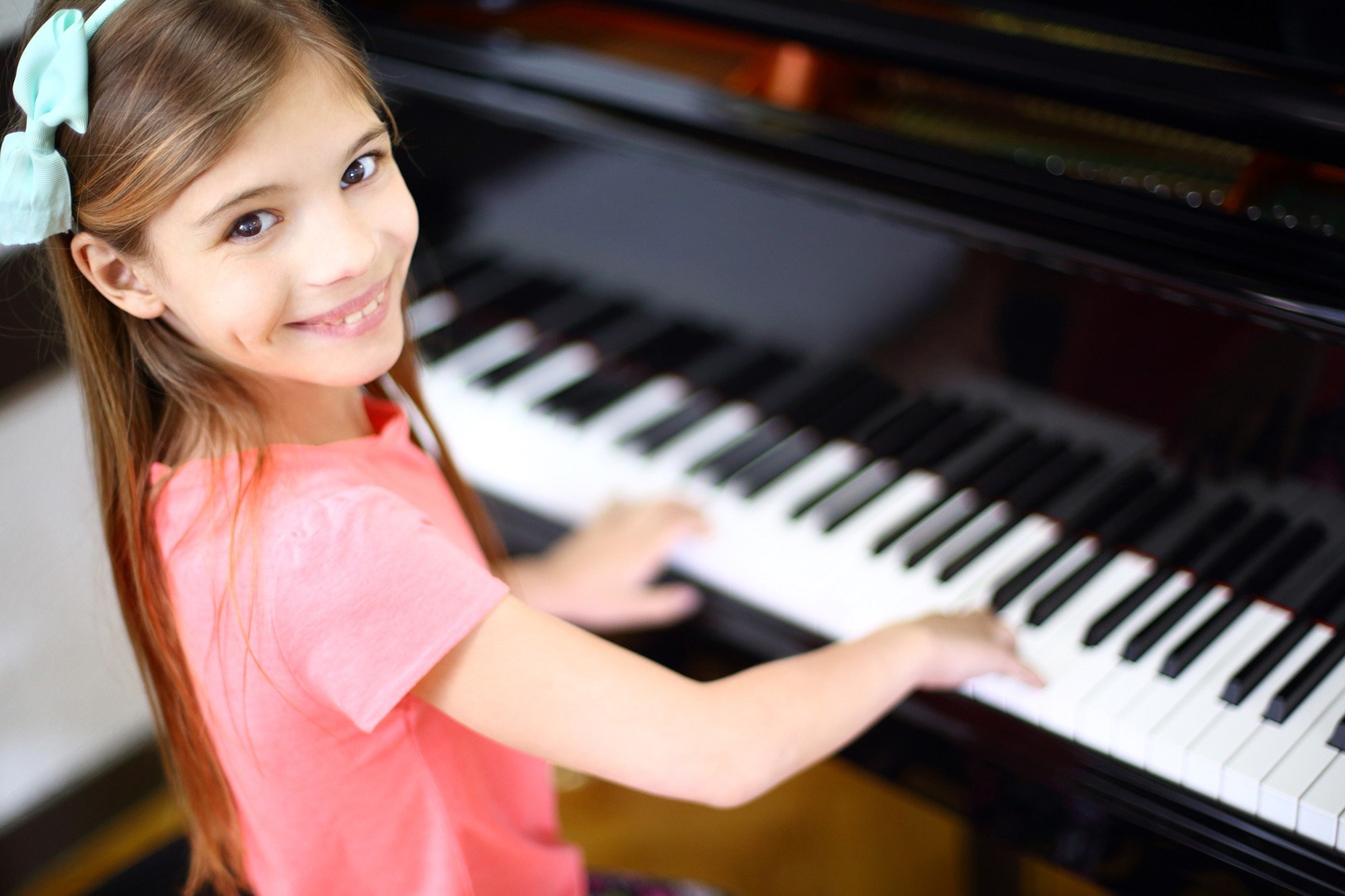 girl playing piano.jpg